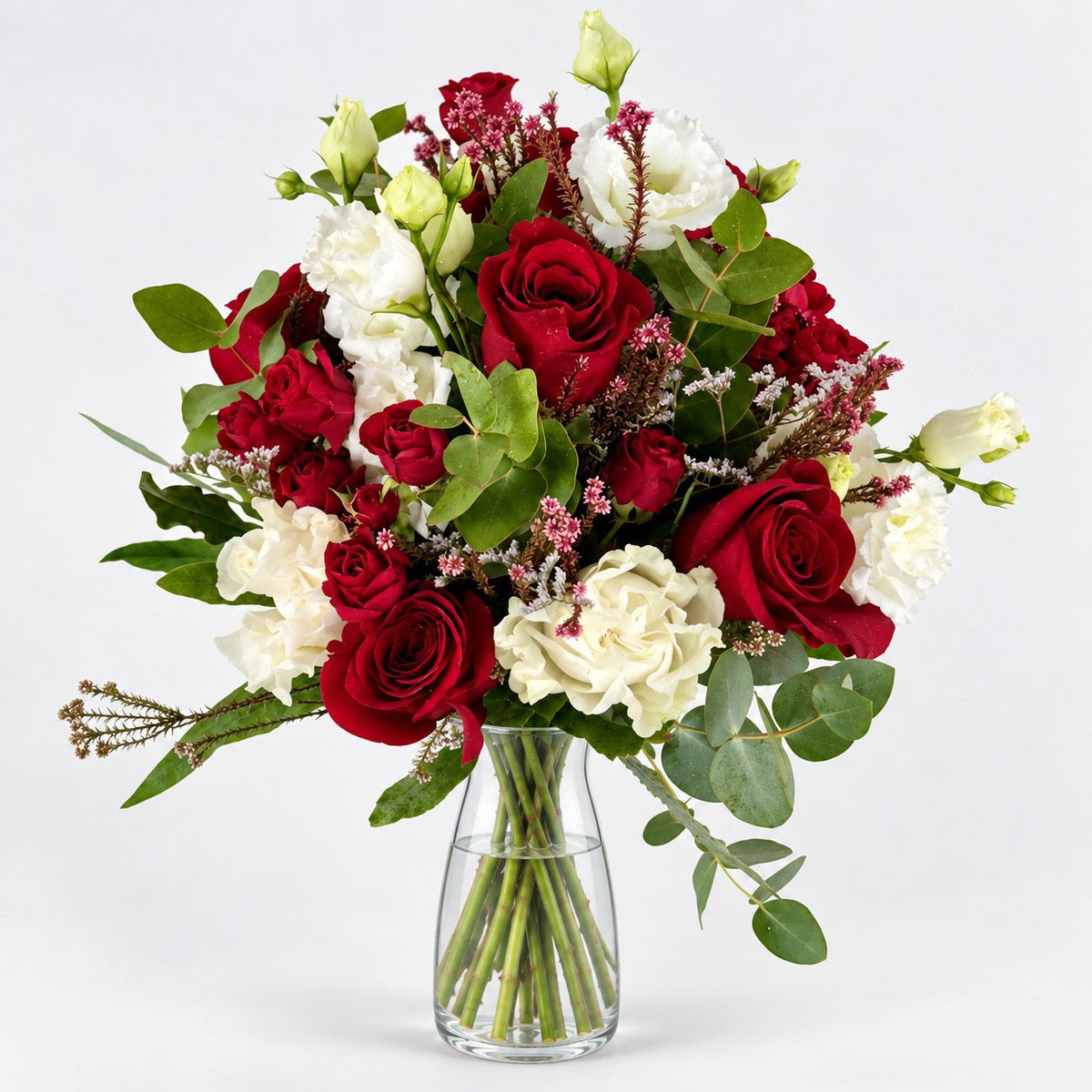 Alma | Bouquet of Red Roses, Red Spray Roses, White Lisianthus, and Eucalyptus.