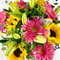 Ramo Alegría – Gerbera Rosa, Girasoles y Lilium Blanco — flores en tonos amarillo, naranja, rosa | Persa Flores
